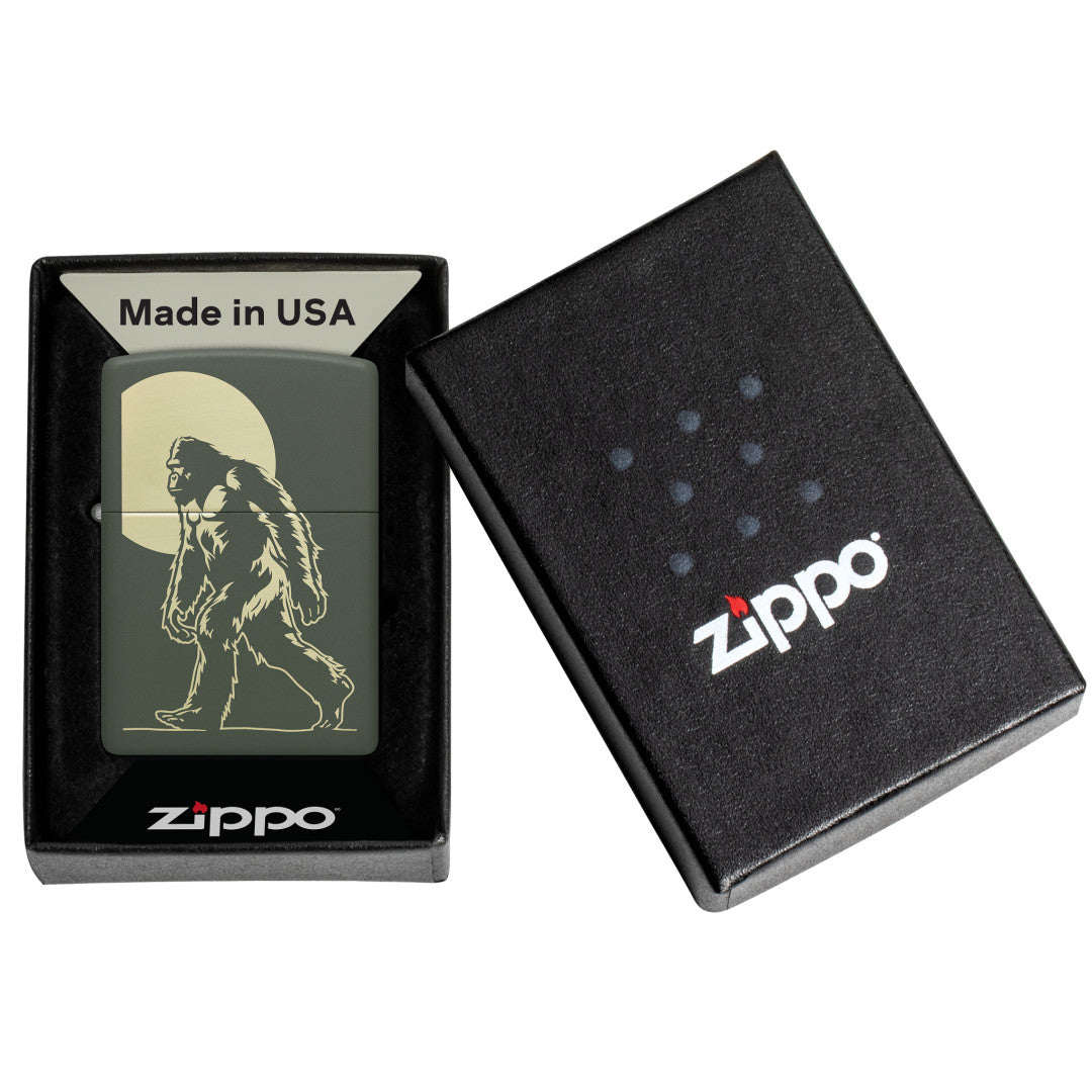 Zippo Sasquatch Stroll Design Green Matte Windproof Lighter in its packaging.