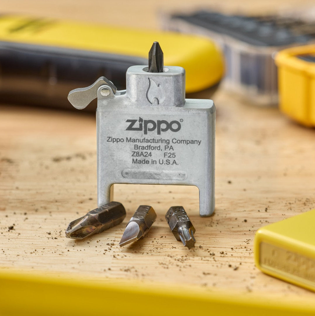 Lifestyle Image of Bit Safe Screwdriver USA standing on wood worktable with sunflower case and tools in the background.