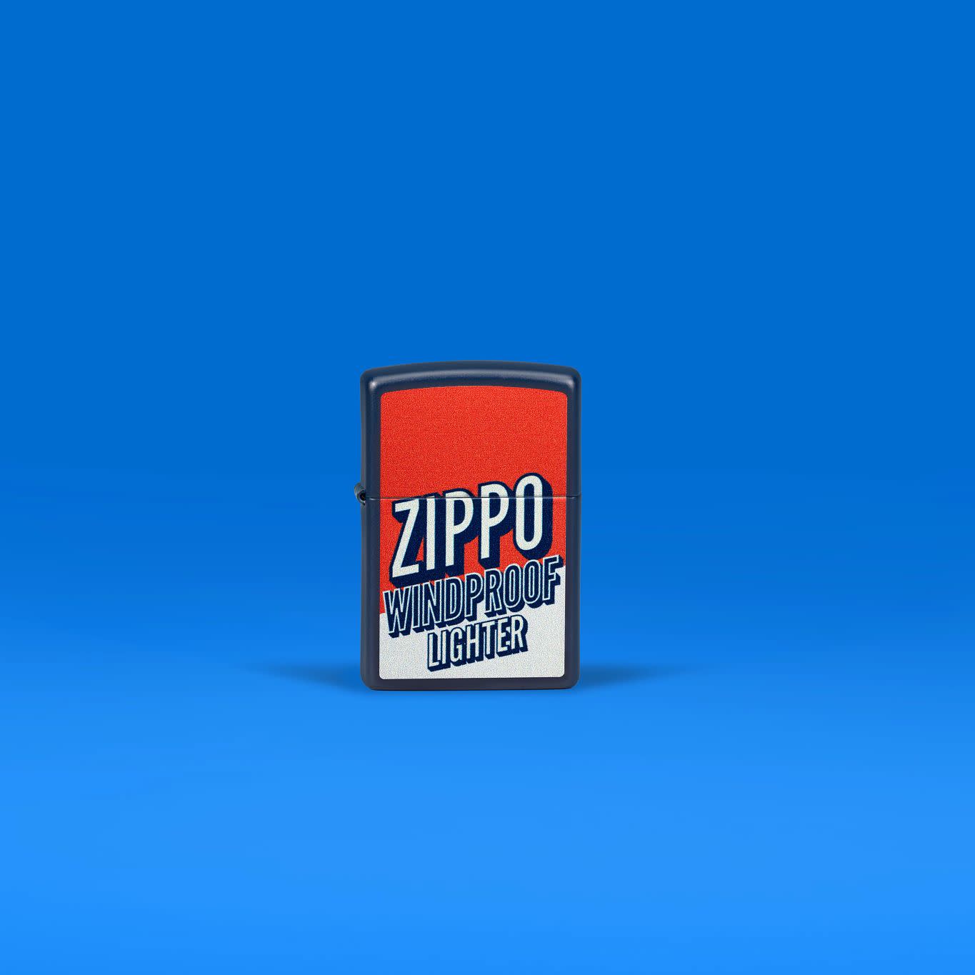 Lifestyle image of Zippo Color Block Zippo Design Navy Matte Windproof Lighter in a blue scene.