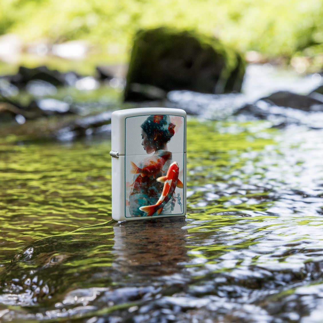 Lifestyle shot of Zippo Mazzi Texture Print White Matte Windproof Lighter standing in a river.