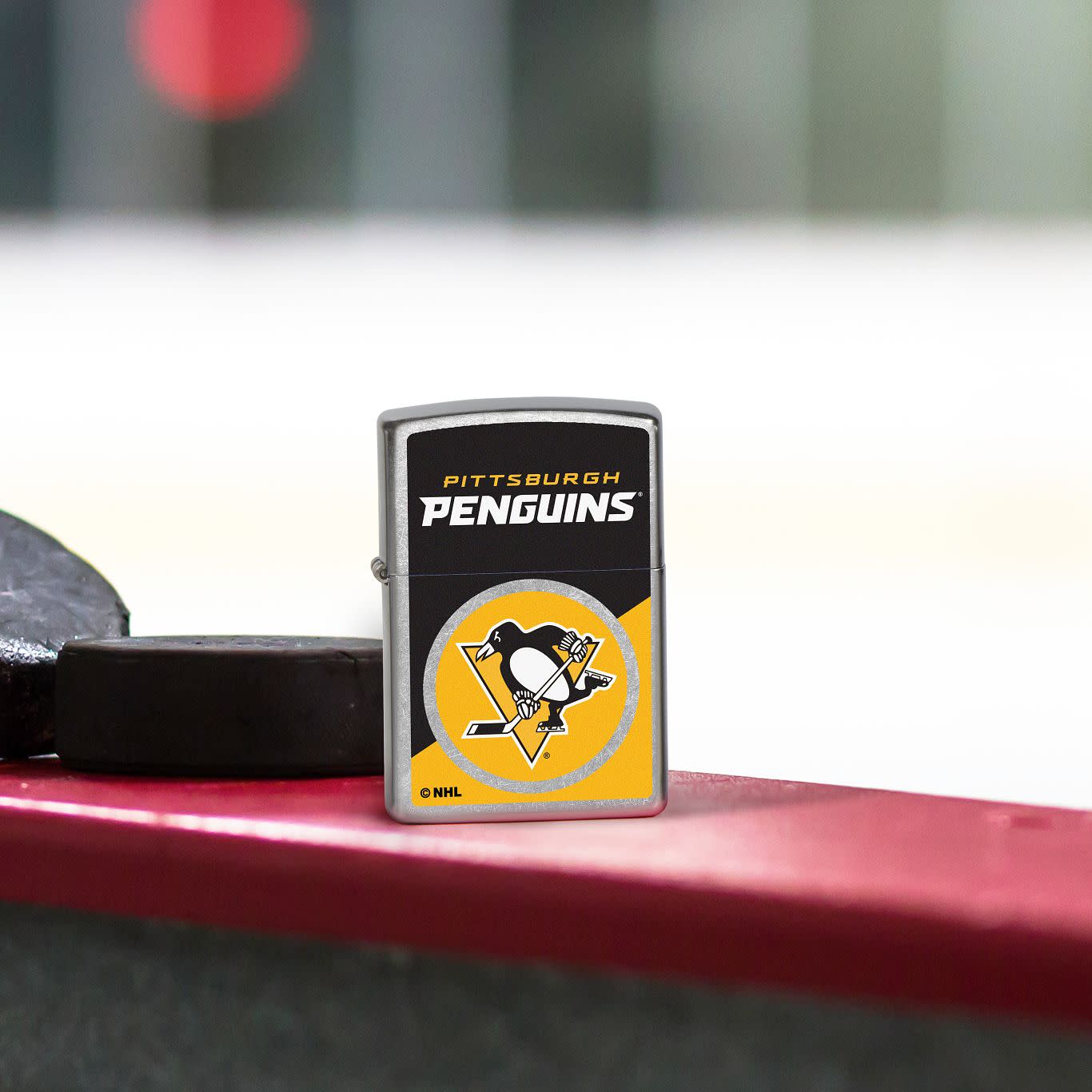 Front view of Zippo NHL® Pittsburgh Penguins® 2024 Street Chrome™ Windproof Lighter.