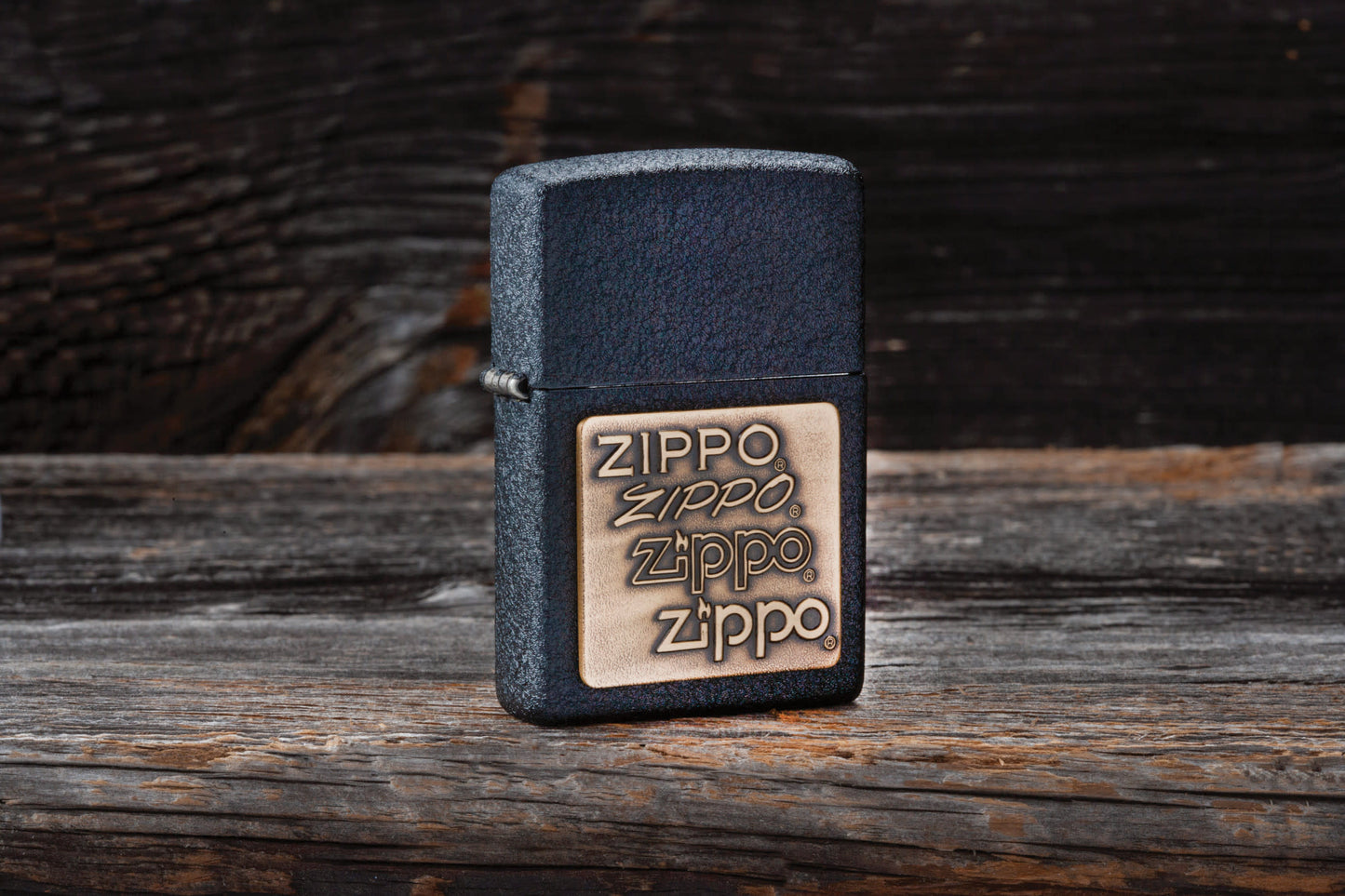 Lifestyle image of the Black Crackle® Brass Zippo Logo Emblem Lighter