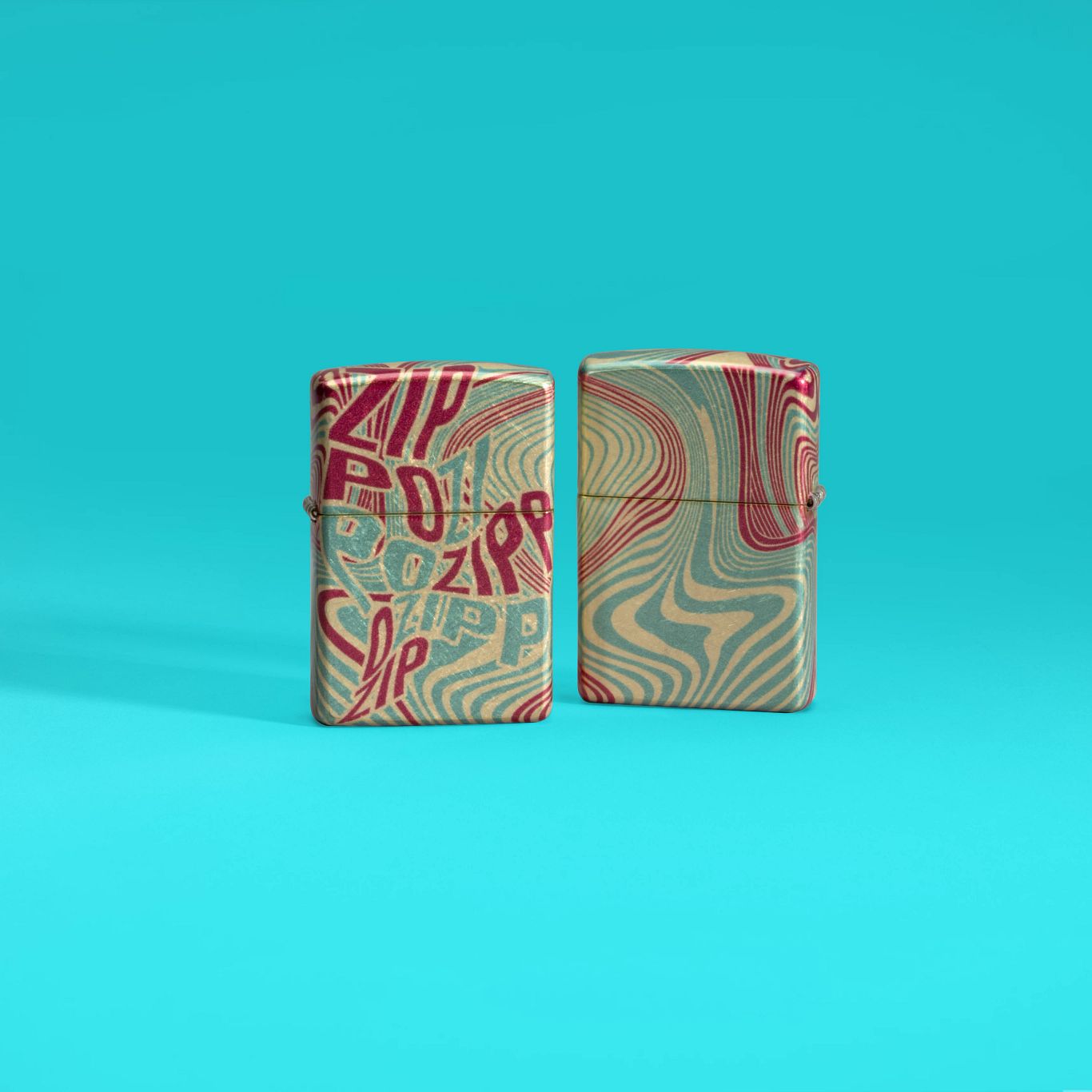 Lifestyle image of two Zippo Zag Design 540 Tumbled Brass Windproof Lighters, one showing the front of the lighter and the other showing the back, standing against a turquoise blue background.