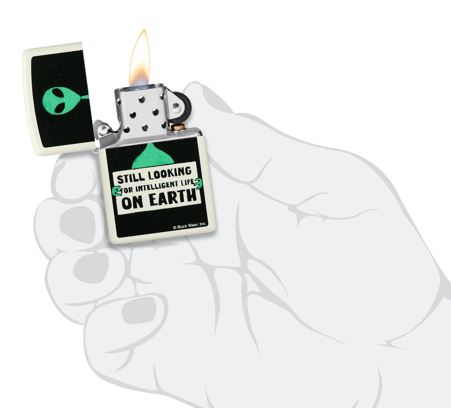 Zippo Buck Wear Alien Design Glow in the Dark Green Matte Windproof Lighter lit in hand.