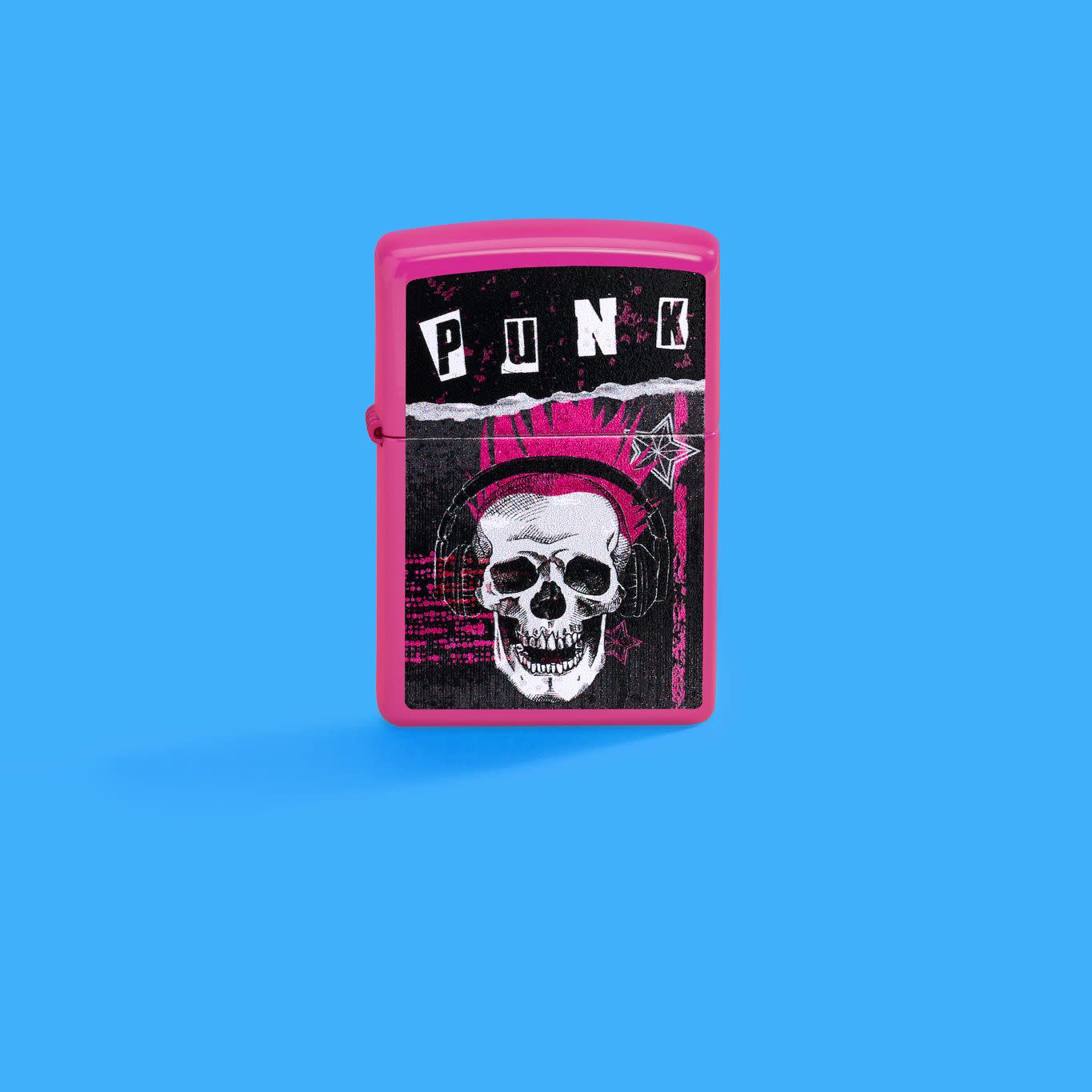 Lifestyle image of Zippo Punk Skull Design Frequency Windproof Lighter in a blue scene.