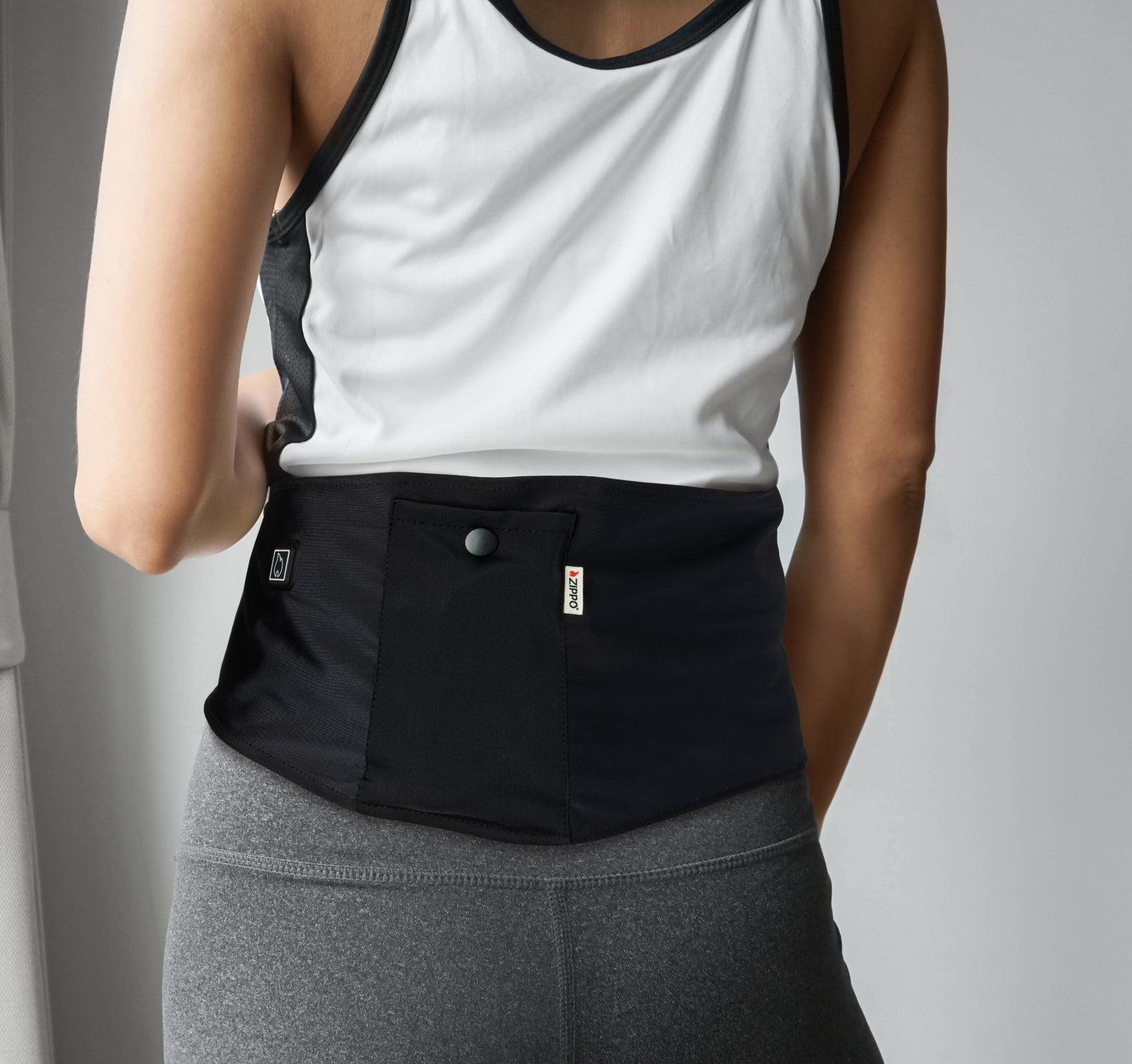 Lifestyle image of Zippo Heated Wrap showing the back of the wrap while being worn.