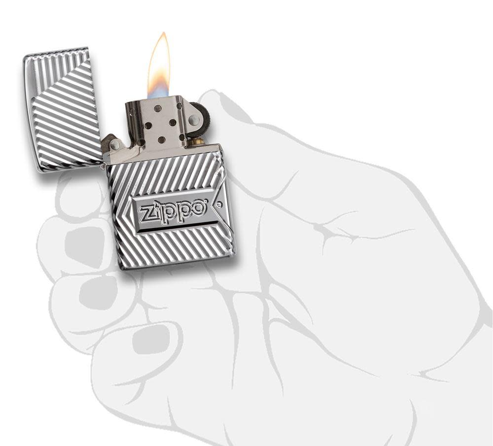 Zippo Bolts Design Windproof Lighter lit in hand