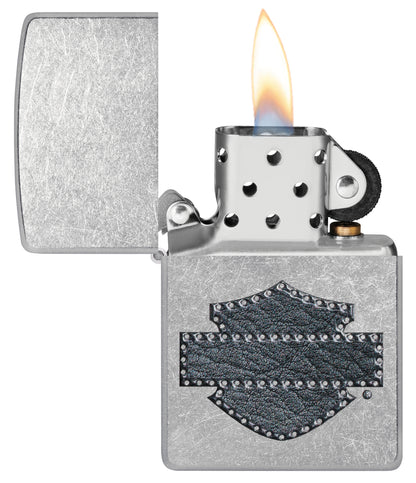 Zippo Harley-Davidson® Leathered Logo Design Street Chrome Windproof Lighter with its lid open and lit.