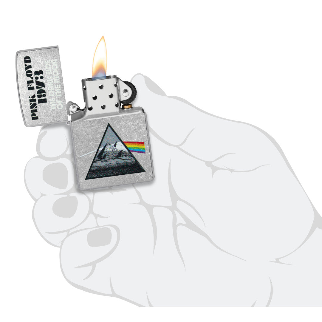 Zippo Pink Floyd 1973 Design Street Chrome Windproof Lighter lit in hand.