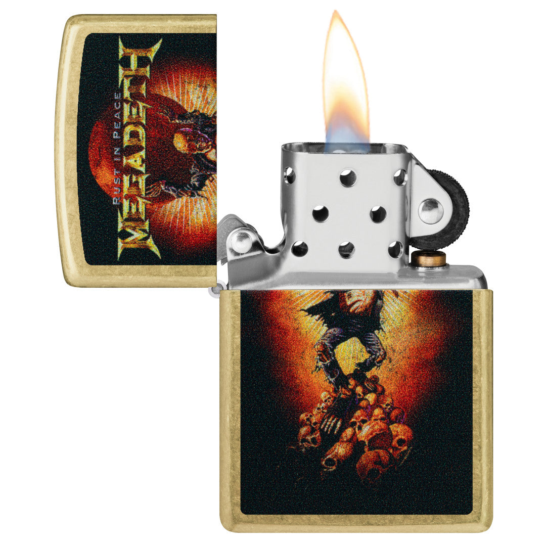 Zippo Megadeth Rust In Peace Design Street Brass Windproof Lighter with its lid open and lit.
