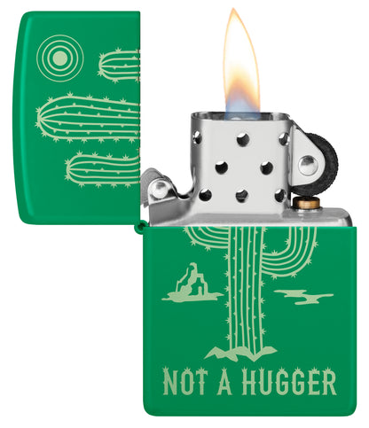 Zippo Not a Hugger Design Grass Green Matte Windproof Lighter with its lid open and lit.
