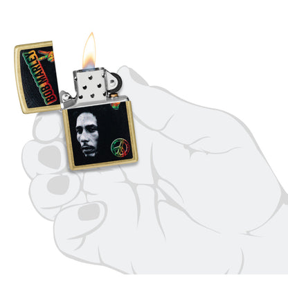 Zippo Bob Marley Peace Design Street Brass Windproof Lighter lit in hand.
