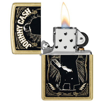 Zippo Johnny Cash Walk Design Street Brass Windproof Lighter with its lid open and lit.