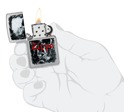 Zippo Skull Design Street Chrome Windproof Lighter lit in hand.