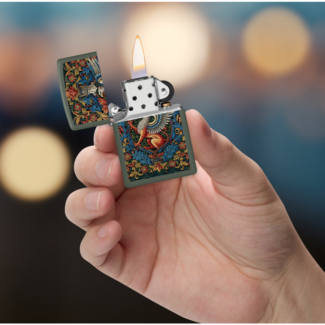 Zippo Gryphon Design Green Matte Windproof Lighter lit in hand.