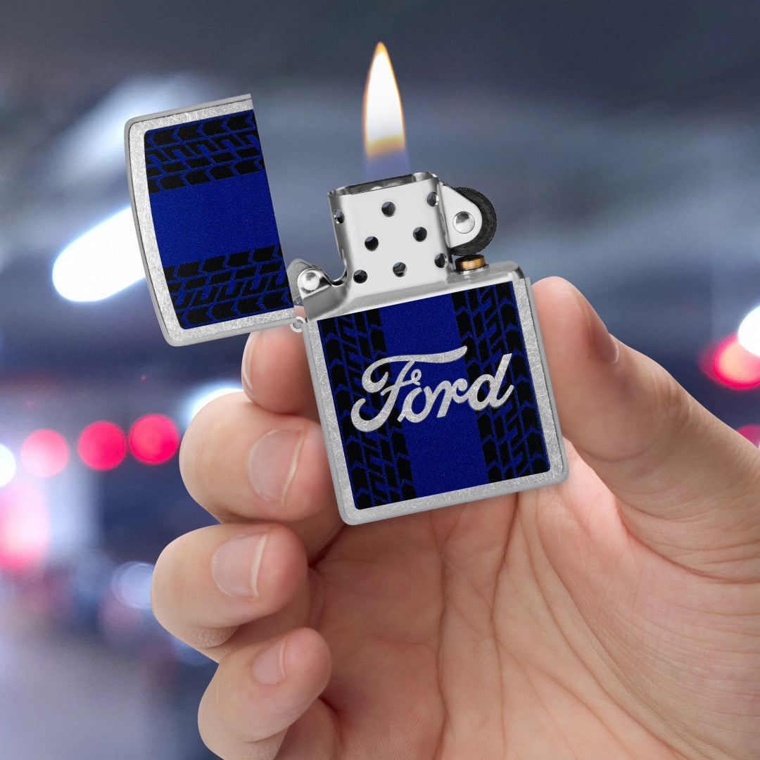Zippo Ford Racing Stripes Design Street Chrome Windproof Lighter lit in hand.