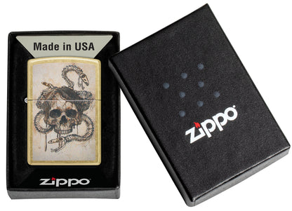 Zippo Skull and Snakebones Design Street Brass Windproof Lighter in its packaging.