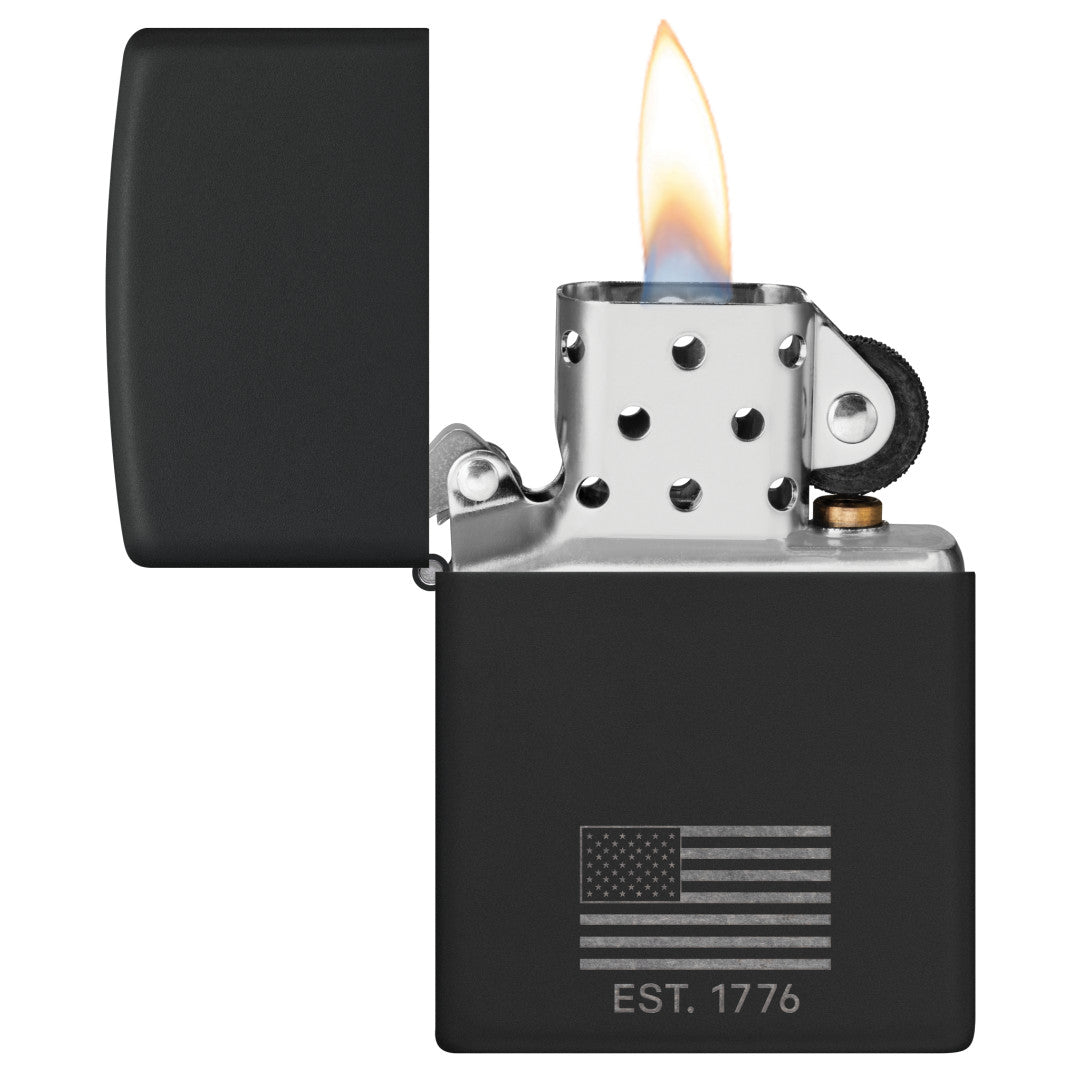 Zippo Because of the Brave Design Black Matte with Chrome Windproof Lighter with its lid open and lit.