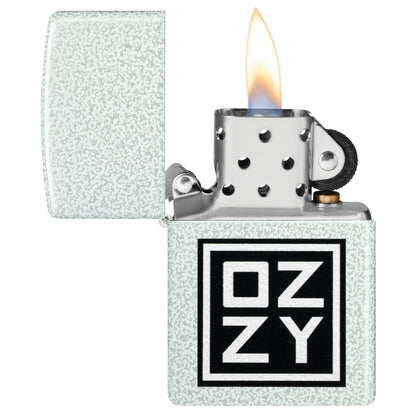 Zippo Ozzy Osbourne Block Design Glacier Windproof Lighter with its lid open and lit.