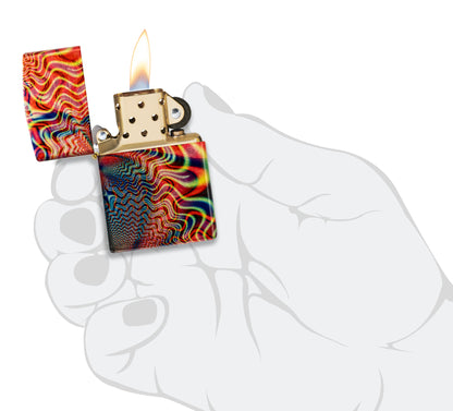Zippo Fusion Waves Design 540 Tumbled Brass Windproof Lighter lit in hand.