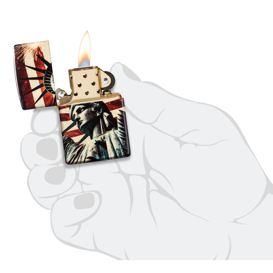 Zippo Spark of Liberty Design 540 Tumbled Brass Windproof Lighter lit in hand.
