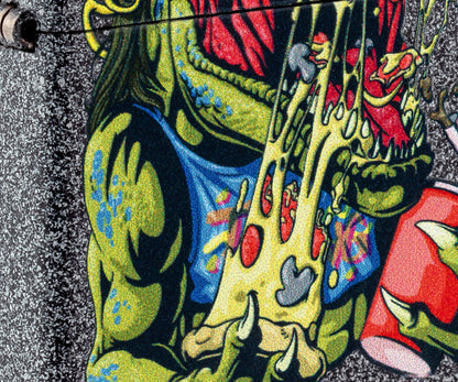 Front view of Zippo Cheese Rex Design Iron Stone Windproof Lighter close up to show the detail of the lighter.