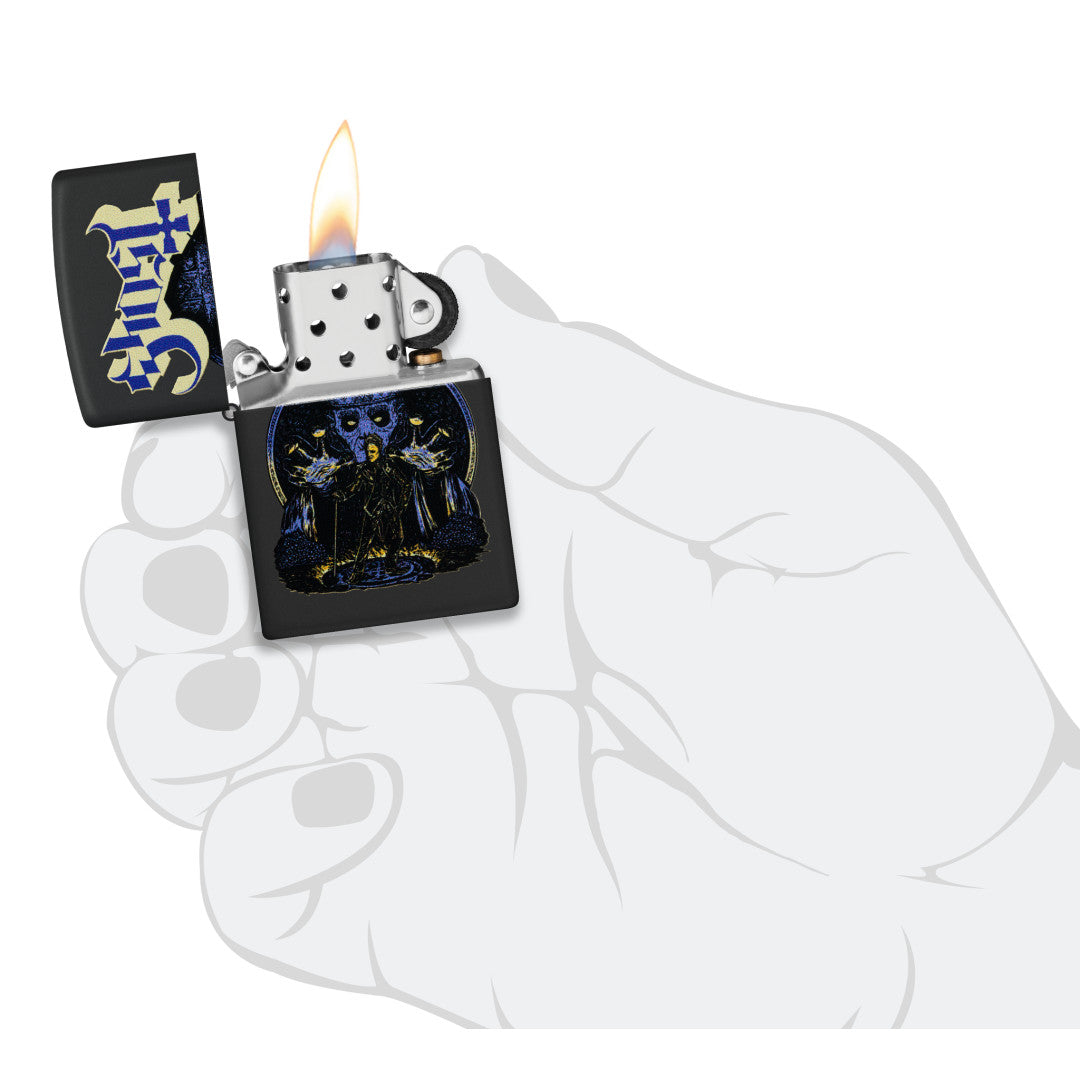 Zippo Ghost Papa Design Black Matte Windproof Lighter lit in hand.