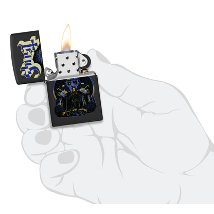 Zippo Ghost Papa Design Black Matte Windproof Lighter lit in hand.