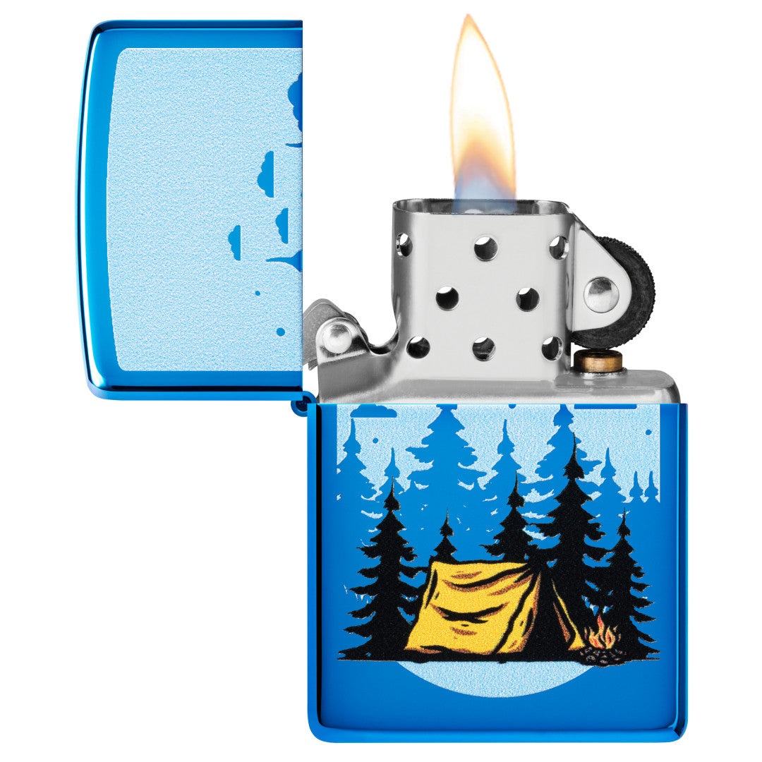 Zippo Forest Flicker Design High Polish Blue Windproof Lighter with its lid open and lit.