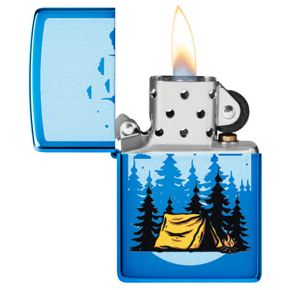 Zippo Forest Flicker Design High Polish Blue Windproof Lighter with its lid open and lit.