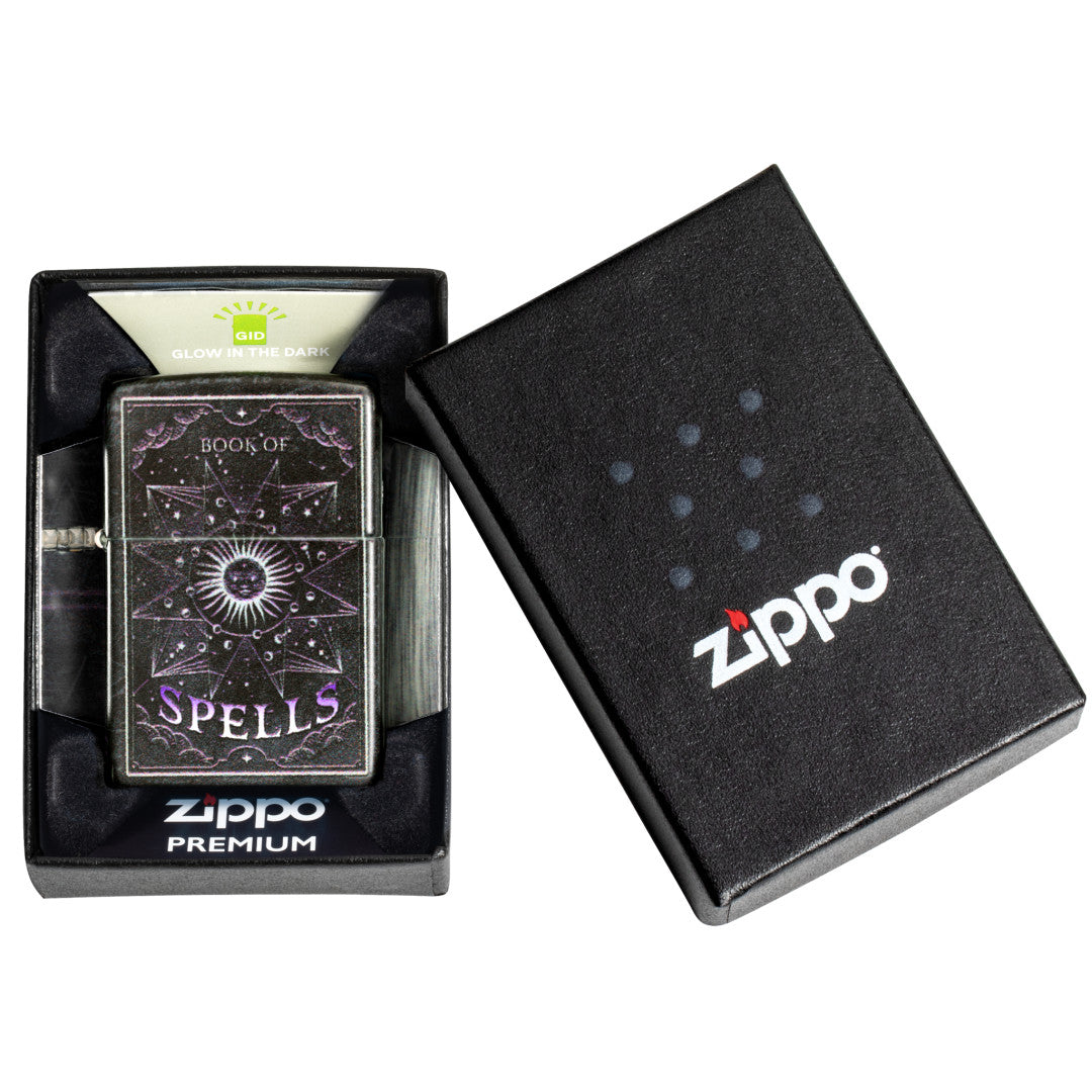 Zippo Mystic Book Design 540 Color Glow in the Dark Windproof Lighter
 in its packaging.