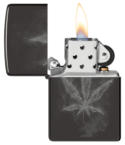 Zippo Wispy Leaf Design High Polish Black Windproof Lighter with its lid open and lit.