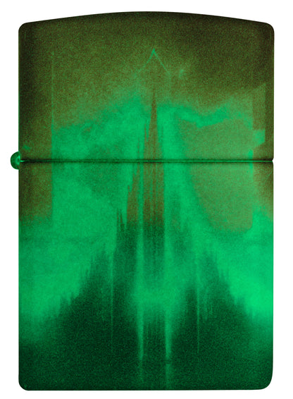 Front view of Zippo Wicked City Design Glow in the dark Green Windproof Lighter glowing in the dark.