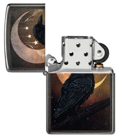 Zippo Raven Moon Design Grey Windproof Lighter with its lid open and unlit.