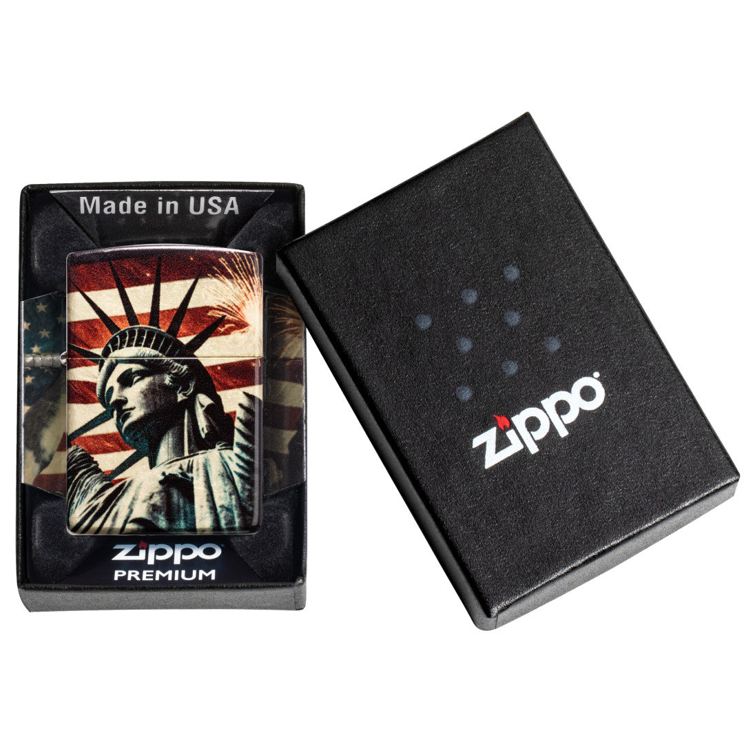 Zippo Spark of Liberty Design 540 Tumbled Brass Windproof Lighter in its packaging.