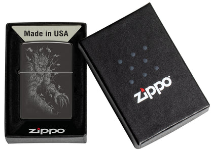 Zippo Root of All Evil Design High Polish Black Windproof Lighter in its packaging.