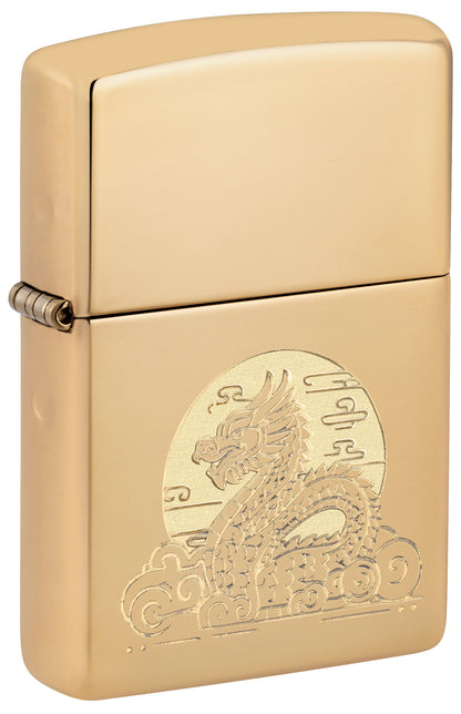 Front shot of Zippo Moon Dragon Design High Polish Brass Windproof Lighter standing at a 3/4 angle.