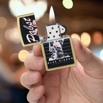 Zippo Pabst Blue Ribbon® American Classic Design Street Brass Windproof Lighter lit in hand.