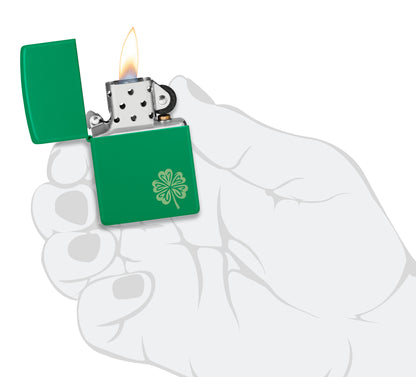 Zippo Lucky Clover Design Grass Green Matte Windproof Lighter lit in hand.