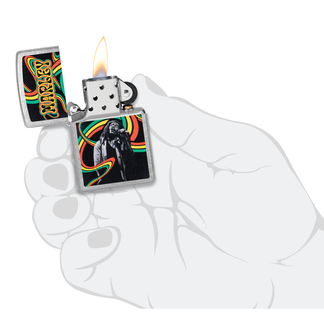 Zippo Bob Marley Waves Design Street Chrome Windproof Lighter lit in hand.