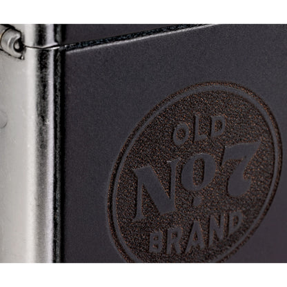 Front view of Zippo Jack Daniel's Old No. 7 Leather Emblem Street Chrome Windproof Lighter close up to show the detail of the lighter.