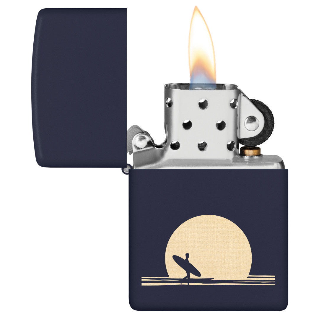 Zippo Sun and Surf Design Navy Matte Windproof Lighter with its lid open and lit.