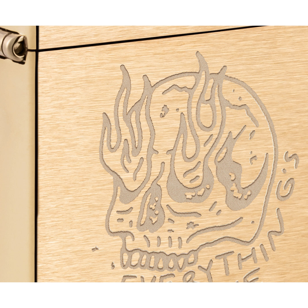 Front view of Zippo Everything's Fine Design Vintage Brushed Brass Windproof Lighter close up to show the detail of the lighter.