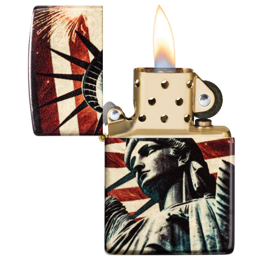 Zippo Spark of Liberty Design 540 Tumbled Brass Windproof Lighter with its lid open and lit.