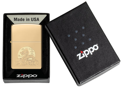Zippo Moon Dragon Design High Polish Brass Windproof Lighter in its packaging.