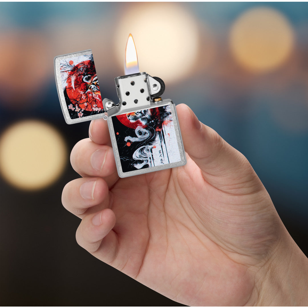 Zippo Tiger Blossom Design Street Chrome Windproof Lighter lit in hand.