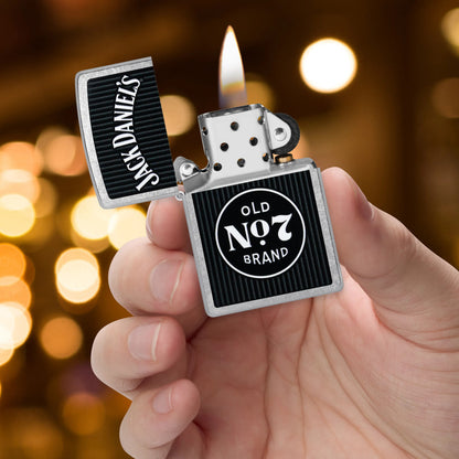 Zippo Jack Daniel's Old No. 7 Pinstripe Design Street Chrome Windproof Lighter lit in hand.