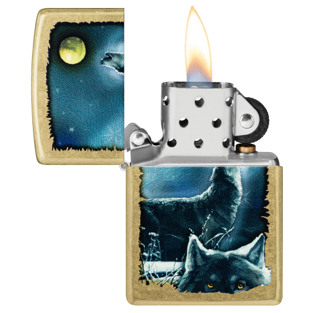 Zippo Wolf Song Design Street Brass Windproof Lighter with its lid open and lit.
