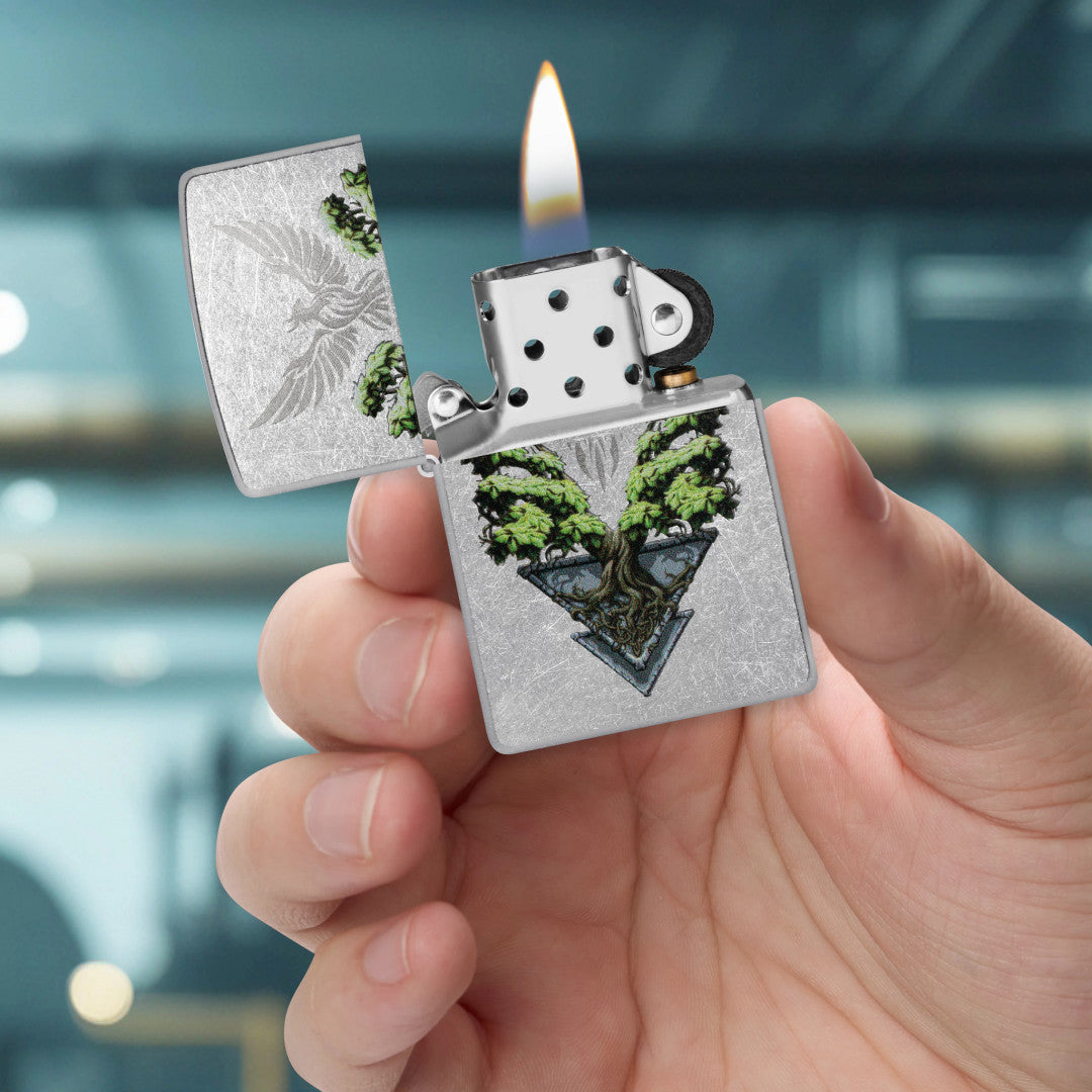 Zippo Phoenix Tree Design Street Chrome Windproof Lighter lit in hand.