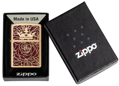 Zippo Queen of Bud Rose and Crown Design Brushed Brass Windproof Lighter in its packaging.